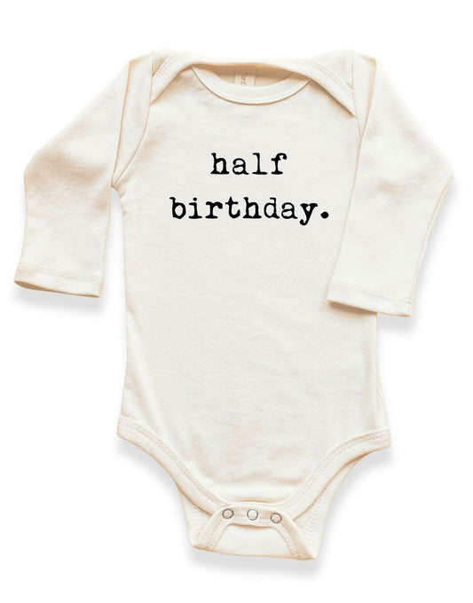 organic cotton Baby onesie with 'half birthday.' text made in usa tenth and pine